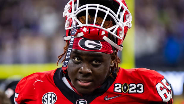 Jan 9, 2023; Inglewood, CA, USA; Georgia Bulldogs offensive lineman Amarius Mims (65) against the TCU Horned Frogs during the CFP national championship game at SoFi Stadium. Mandatory Credit: Mark J. Rebilas-USA TODAY Sports
